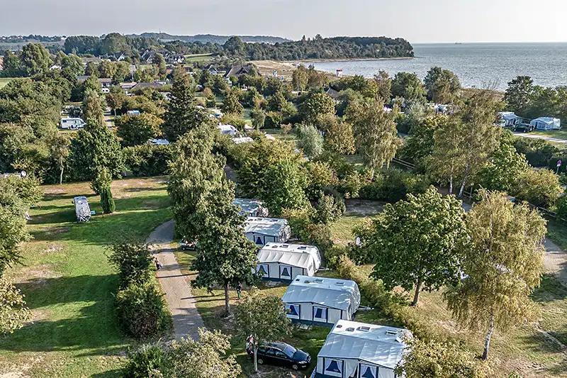 Aerial photograph of the campsite Stranddörp Lobbe overlooking the sea